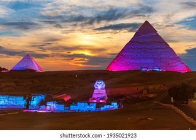 The Great Pyramids of Egypt and the Sphinx, enlighted at night, Giza