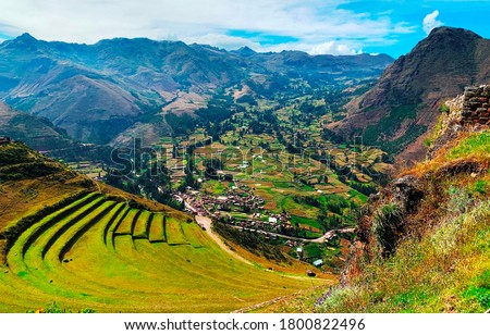 Great Sacred Valley of Inca in Peru. Ancient green agricultural terraces Andenes. Magnificent Andes mountains landscape. Peruvian countryside scene. View on Urubamba valley. Valle Sagrado de los Incas