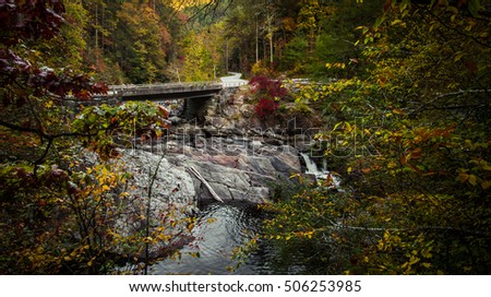 Great Smoky Mountains Autumn Road Trip. Bridge over the roadside Sinks waterfall on Little River Road in the Great Smoky Mountains National Park. Gatlinburg, Tennessee.