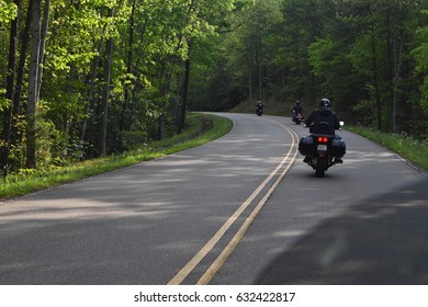 Great Smoky Mountains National Park Group Of Motorcycle Riders, Spring Morning, Green Trees And Grass, Highway 