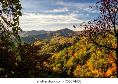 Great Smoky Mountains Scenic Autumn Landscapes. Autumn colors from an overlook in the Great Smoky Mountains National Park in Gatlinburg, Tennessee.
 - Powered by Shutterstock