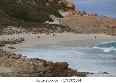 Great Southern Ocean Waves Roll In Onto A White Sandy Beach Where People Are Fishing, Esperance, Western Australia.