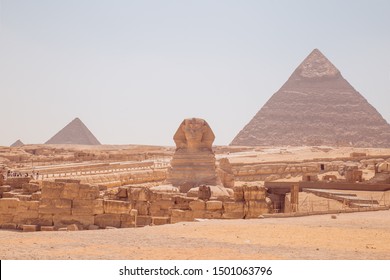 The Great Sphinx of Giza with the amazing Pyramids at the back. Valley of the Kings, Cairo, Egypt. 