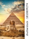 Great sphinx and pyramid under bright sun