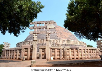 The Great Stupa Flanked By Trees At Sanchi, Near Bhopal, Madhya Pradesh. It Is The Oldest Structure Originally Commissioned By The Emperor Ashoka The Great Of The Maurya Empire In The 3rd Century BC