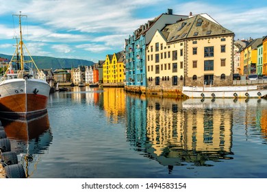 Great summer view of Alesund port town on the west coast of Norway, at the entrance to the Geirangerfjord. Old architecture of Alesund town in city centre.