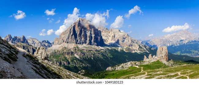 Great sunset view of the top Tofana di Rozes and Cinque Torri range in  Dolomites, South Tyrol. Location Cortina d'Ampezzo, Italy, Europe. Dramatical cloudy scene. Beauty of mountains world. - Shutterstock ID 1049183123