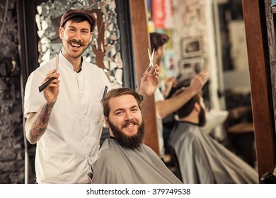 Great time at barbershop with barber and customer  - Powered by Shutterstock