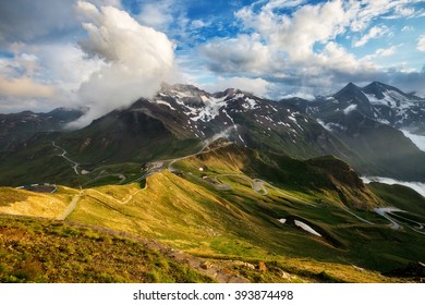 A great view of the green hills glowing by sunlight. Dramatic and picturesque morning scene. Location famous resort Grossglockner High Alpine Road, Austria. Europe. Artistic picture. Beauty world. 