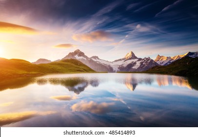 Great view of Mt. Schreckhorn and Wetterhorn above Bachalpsee lake . Dramatic and picturesque scene. Location place Swiss alps, Bernese Oberland, Grindelwald, Europe. Soft filter effect. Beauty world.