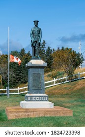 Great Village, Nova Scotia, Canada - September 25, 2020 : Canadian Flag At Half Mast At First World War Memorial For The Recent Passing Of Former Canadian Prime Minister John Turner. Turner Was Canada