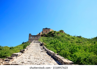 The Great Wall is in China. The Great Wall is under the blue sky and white clouds - Shutterstock ID 1518957623