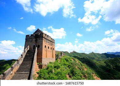 The Great Wall is in China. The Great Wall is under the blue sky and white clouds