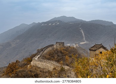 Great Wall path of the Mutianyu section near Beijing in Autumn season with golden yellow colors