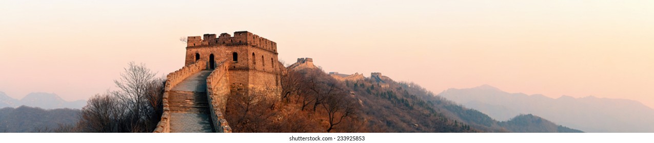 Great Wall sunset panorama over mountains in Beijing, China.