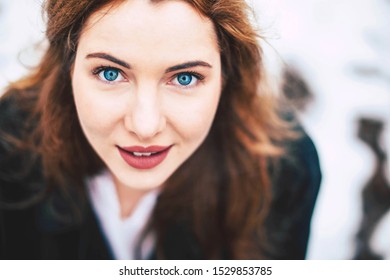 Great Young Woman Portrait With Blue Eyes In Winter