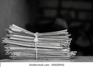 Greater pack of newspapers on a table
