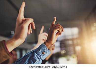 The greatest gift is not being afraid to question. Cropped shot of hands being raised to ask a question. - Shutterstock ID 2129742743
