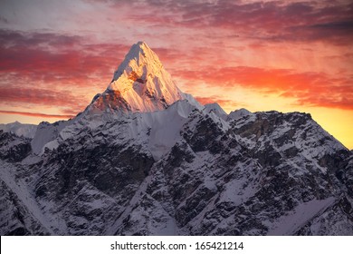 Greatness of nature. Ama Dablam peak (6856 m) at sunset. Nepal, Himalayas.    
Canon 5D Mk II. - Powered by Shutterstock