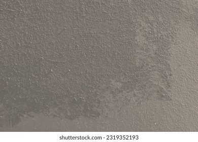 greay grunge plaster wall background with sunlight
