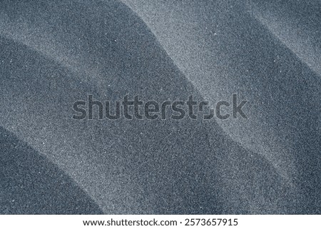 greay sand ripples close up