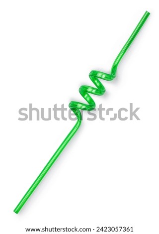 Gree unused curly straw, top view. Isolated on a white background.