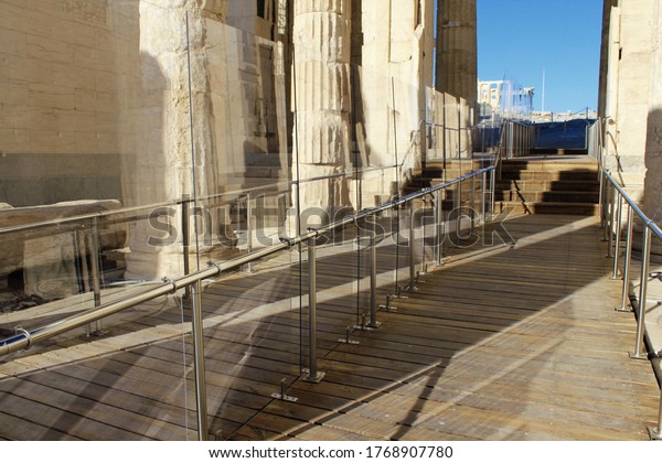 Greece, Athens, June 18 2020 - The\
archaeological site of Acropolis, empty of visitors. Plexiglass\
separators have been installed following a long list of new safety\
rules due to covid-19\
outbreak.