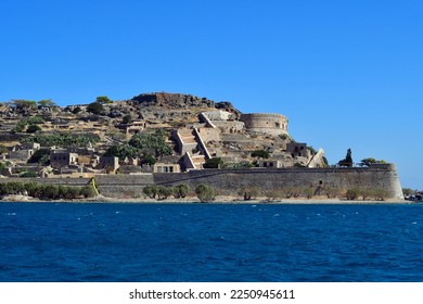 Greece, Crete, old Venetian Fortress Spinalonga, formerly used as a leper station, now a popular tourist destination - Shutterstock ID 2250945611