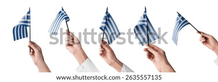 The Greece flag in hand in different angles on a white background