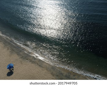 Greece, July 2021. Nice Sea View.  Photo Taken With A Drone In The Beach With Umbrellas And Waves. No People