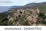 Greece Peloponneso , drone aerial view of Vatheia is a village on the Mani Peninsula, in south-eastern Laconia - abandoned and uninhabited stone village - rural country of Greece