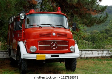 Greece, Thassos, 04 October 2019: Mercedes-Benz LA 322 Old Fire Engine. Retro-car. Red Mercedes-Benz 1113 Fire Truck Cab With Rain-soaked Windshield