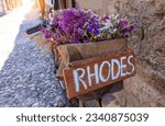 Greece travel destination, colorful streets of Rhodes island city Rhodes in historic city center.