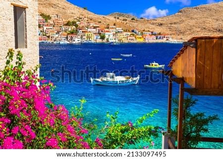 Greece travel and summer holidays. Charming typical greek islands of Dodecanese - beautiful colorful Chalki. 