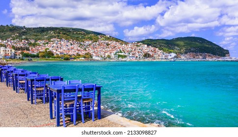 Greece travel. Typical fish tavern (restaurant) by the sea in Skopelos island. Sporades. Greek summer holidays and destinations