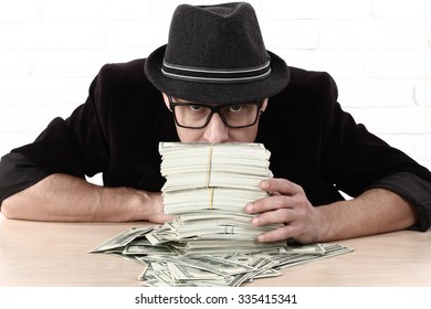 Greed Emotional Man In Glasses Holding Bundles Of Money 