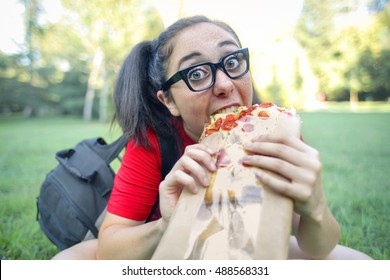 Greedy Girl Eating Pizza