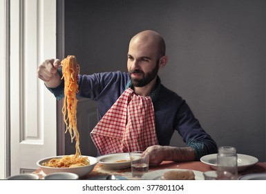 Greedy Man Eating Pasta