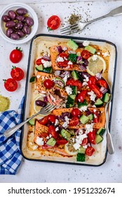 Greek Baked Salmon With Greek Salad.style Rustic.selective Focus