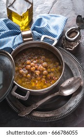 Greek Chickpea Soup On The Metal Background Vertical