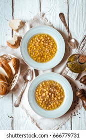 Greek Chickpea Soup In The White Wooden Table Top View