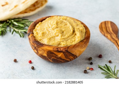 Greek Dips And Spreads. Hummus In An Olive Wood Bowl With Hot Homemade Pita Bread