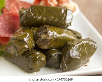 Greek Dolmades Wrapped With Vine Leaves Feature In A Mezze Platter.