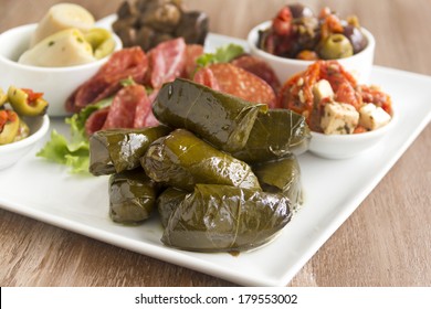 Greek Dolmades Wrapped With Vine Leaves Feature In A Mezze Platter.