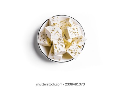 Greek Feta Cheese isolated on white background, top view. Fresh Feta cheese seasoning with herbs. - Powered by Shutterstock