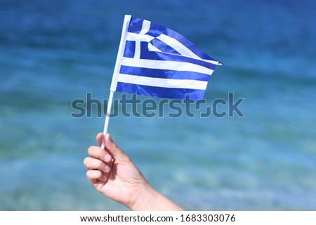 Greek flag on the beach