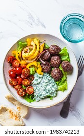 Greek Food Concept. Meatballs, Tzatziki Sauce, Tomato And Cucumber Salad, Top View.