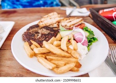 Greek Gyro Platter With Pita Bread And Fries