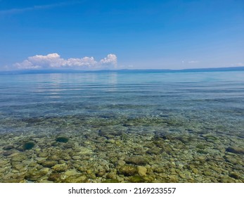 Greek Halkidiki Beach With Rocks Underwater