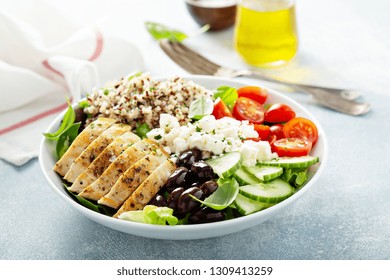 Greek Inspired Lunch Bowl With Chicken, Quinoa, Feta Cheese And Olives